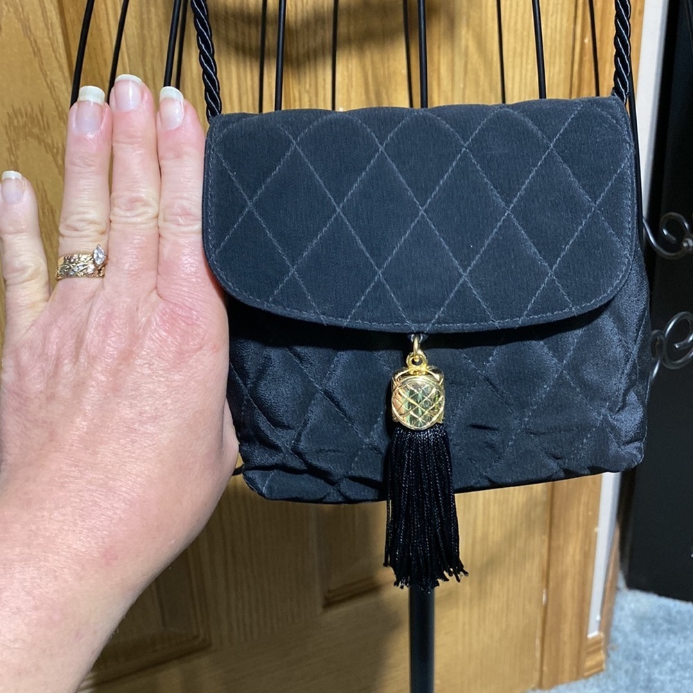 Neiman Marcus Gold Tassel Bag Small
Luxury purse​​ - Picture 7 of 11